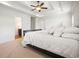 Inviting bedroom with neutral tones, a ceiling fan, and carpeted floors at 3202 Saute Way, Avondale Estates, GA 30002
