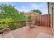 Relaxing backyard deck features patio furniture and wooded view at 3202 Saute Way, Avondale Estates, GA 30002