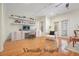 Home office with desk, shelving and bright natural light from a nearby door at 3202 Saute Way, Avondale Estates, GA 30002