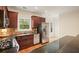 Charming kitchen featuring stainless steel appliances, granite counters, and bright natural light at 3202 Saute Way, Avondale Estates, GA 30002
