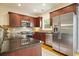 Bright kitchen with stainless steel appliances, granite countertops, and ample cabinet space at 3202 Saute Way, Avondale Estates, GA 30002