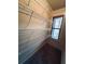 Well-lit walk-in closet featuring wire shelving and a window for natural light at 3202 Saute Way, Avondale Estates, GA 30002