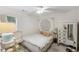 Cozy bedroom featuring a mandala tapestry, modern decor, and a bright window at 733 Exchange Mill Pl, Dacula, GA 30019