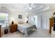 Spacious primary bedroom featuring tray ceilings and neutral decor at 733 Exchange Mill Pl, Dacula, GA 30019