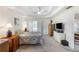 Spacious primary bedroom featuring tray ceilings and neutral decor at 733 Exchange Mill Pl, Dacula, GA 30019