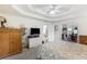 Spacious primary bedroom featuring tray ceilings and neutral decor at 733 Exchange Mill Pl, Dacula, GA 30019