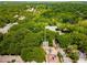 A gorgeous aerial view of the property site surrounded by lush greenery and mature trees at 1200 Mansfield Ne Ave, Atlanta, GA 30307