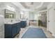The primary bathroom boasts double vanities, a separate shower, and a soaking tub at 1625 Hawkins Cove Trl, Roswell, GA 30076