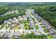 Overhead shot of homes in a suburban neighborhood, featuring landscaped yards and mature trees at 302 Aspen Valley Ln, Dallas, GA 30157