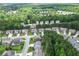 Aerial view of a home with wooded surroundings, showcasing the backyard at 302 Aspen Valley Ln, Dallas, GA 30157