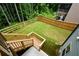 Picture of a well-manicured backyard with a wooden fence, stairs leading to upper deck at 302 Aspen Valley Ln, Dallas, GA 30157