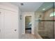 Bathroom showing the walk-in shower with a view into the main bedroom at 302 Aspen Valley Ln, Dallas, GA 30157
