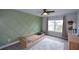 Modern bedroom with a geometric accent wall, carpet, and large windows at 302 Aspen Valley Ln, Dallas, GA 30157