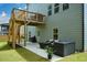 Back exterior showcasing a patio, deck, and stairs, perfect for outdoor enjoyment and entertaining at 302 Aspen Valley Ln, Dallas, GA 30157