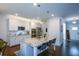 Gourmet kitchen featuring stainless steel appliances, granite counters, and dark hardwood floors at 302 Aspen Valley Ln, Dallas, GA 30157