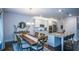 Spacious kitchen featuring a center island, stainless steel appliances, and dark hardwood floors at 302 Aspen Valley Ln, Dallas, GA 30157