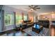 Inviting living room featuring plush seating, hardwood floors, and lots of natural light at 302 Aspen Valley Ln, Dallas, GA 30157