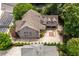 Aerial view of a brick two-story house with a multi-car garage at 400 Mabry Pl, Atlanta, GA 30319