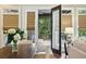 Inviting covered back porch perfect for relaxing, overlooking a serene and private backyard at 400 Mabry Pl, Atlanta, GA 30319