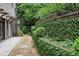 Backyard featuring a stone walkway and brick wall at 400 Mabry Pl, Atlanta, GA 30319