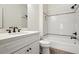 Bright bathroom featuring a shower-tub combo and white cabinets at 400 Mabry Pl, Atlanta, GA 30319