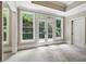 Bedroom filled with natural light from large windows and doors leading to the outside at 400 Mabry Pl, Atlanta, GA 30319