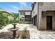 Two-story brick house with a water fountain in the drive at 400 Mabry Pl, Atlanta, GA 30319