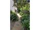 A charming garden path is lined with hydrangeas and leads toward the home at 400 Mabry Pl, Atlanta, GA 30319