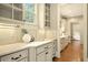 Well-appointed kitchen area featuring granite countertops, custom cabinets, and ample countertop space at 400 Mabry Pl, Atlanta, GA 30319