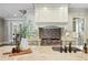 Close-up of the granite countertop island with luxury sink and gas range cooktop with stone backsplash at 400 Mabry Pl, Atlanta, GA 30319