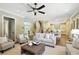 Open living space with hardwood flooring, neutral walls, and a view of the kitchen at 400 Mabry Pl, Atlanta, GA 30319