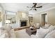 Cozy living room featuring built-in shelving, fireplace, and a neutral color scheme at 400 Mabry Pl, Atlanta, GA 30319