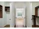 Walk-in closet leading to a bright bathroom with built in storage at 400 Mabry Pl, Atlanta, GA 30319