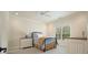 Cozy bedroom with natural light, a comfortable bed, and stylish furniture at 6017 Chestatee Creek Nw Ct, Acworth, GA 30101