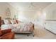 Spacious bedroom featuring neutral colors, crown molding, and ample natural light at 6017 Chestatee Creek Nw Ct, Acworth, GA 30101