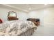 This bedroom features neutral walls, carpet flooring, a futon, and a dresser with a decorative mirror at 6017 Chestatee Creek Nw Ct, Acworth, GA 30101