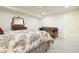 Comfortable bedroom with plush carpeting, vintage dresser and casual couch at 6017 Chestatee Creek Nw Ct, Acworth, GA 30101