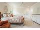 Comfortable bedroom featuring a bed, natural light from windows, and neutral colored walls at 6017 Chestatee Creek Nw Ct, Acworth, GA 30101