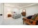 Basement bedroom with a double bed and a wooden settee at 6017 Chestatee Creek Nw Ct, Acworth, GA 30101