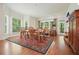 Dining room featuring a table with seating for six and lots of natural light at 6017 Chestatee Creek Nw Ct, Acworth, GA 30101