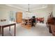 Multipurpose flex room with custom island, ample storage, and natural light at 6017 Chestatee Creek Nw Ct, Acworth, GA 30101