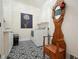 This laundry room features patterned floors, a washer and dryer, and a decorative hall tree at 6017 Chestatee Creek Nw Ct, Acworth, GA 30101