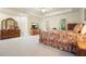 Generously sized main bedroom with a tray ceiling, lots of natural light, and space for dressers and a TV at 6017 Chestatee Creek Nw Ct, Acworth, GA 30101