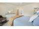 Large bedroom with ample space and walk-in closet, plus natural light and a ceiling fan at 6017 Chestatee Creek Nw Ct, Acworth, GA 30101