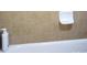 Bathroom featuring a white bathtub and tiled wall with soap holder at 80 Place Fontaine, Lithonia, GA 30038