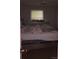 Cluttered bedroom with bed and furniture at 80 Place Fontaine, Lithonia, GA 30038