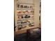 Bright living room featuring a bookcase filled with books and decorative items with access to a closet at 80 Place Fontaine, Lithonia, GA 30038
