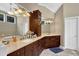 Spacious bathroom with double vanity, granite counters, and custom cabinetry at 1875 Edgemont Ct, Cumming, GA 30041