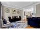Elegant living room featuring hardwood floors, recessed lighting, and sophisticated decor at 1875 Edgemont Ct, Cumming, GA 30041
