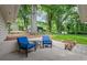 Outdoor patio features a seating area, rock garden, and a lush green lawn at 3119 Medley Rdg, Decatur, GA 30033